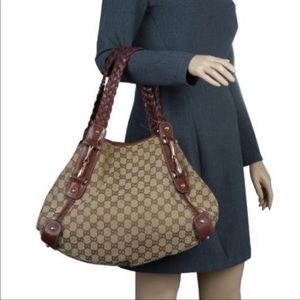 Gucci, Pelham braided canvas shoulder bag.
